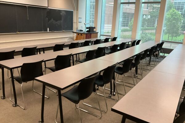  Front of room view with lectern on right in front of chalkboard