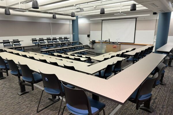 Front of room view with lectern center in front of markerboard