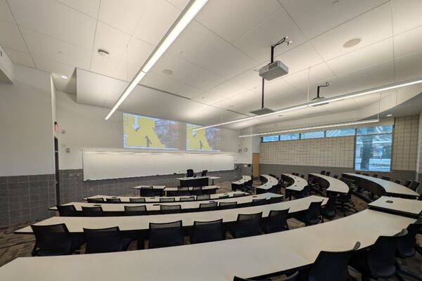 Front of room view with lectern in front of markerboard 