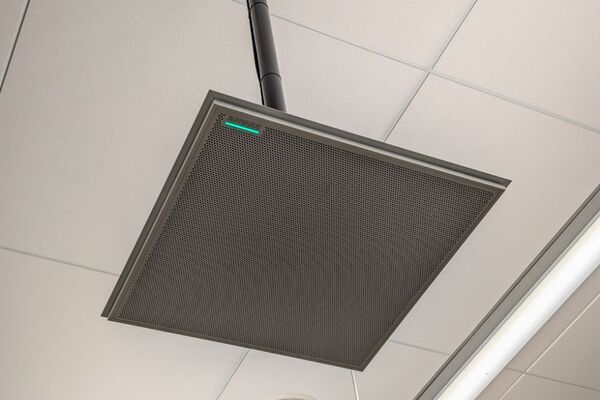 microphone ( tile mounted to the ceiling to provide microphone coverage over student seating )