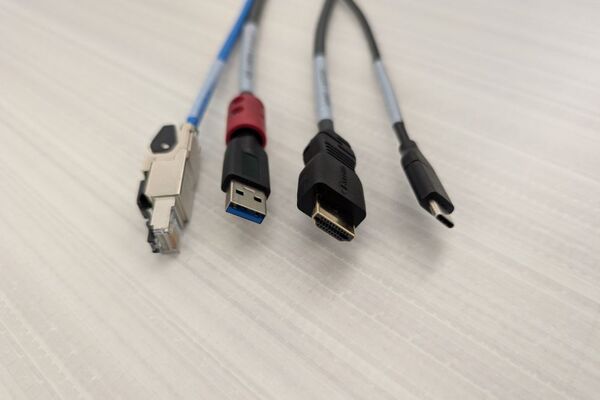 Pedestal - laptop cable connections with cables pulled out showing cable ends