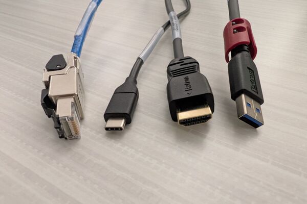 Pedestal - laptop cable connections with cables pulled out showing cable ends