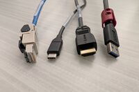 Pedestal - laptop cable connections with cables pulled out showing cable ends
