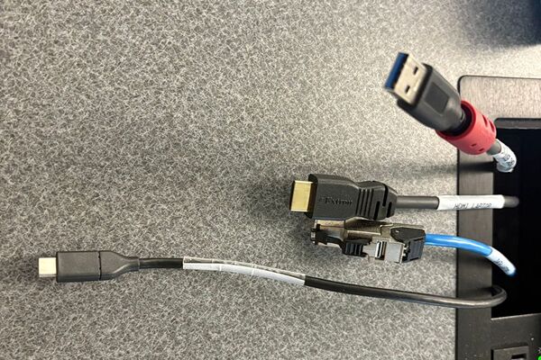 Pedestal - laptop cable connections with cables pulled out showing cable ends