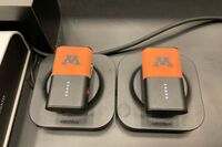 Microphones on top of instructor pedestal with charging base
