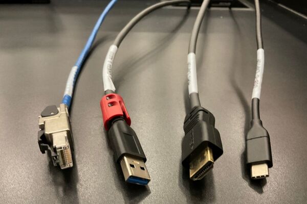 Pedestal - laptop cable connections with cables pulled out showing cable ends