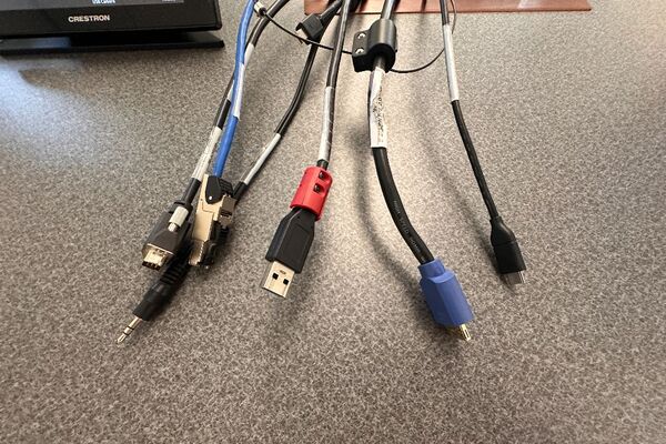 Pedestal - laptop cable connections with cables pulled out showing cable ends