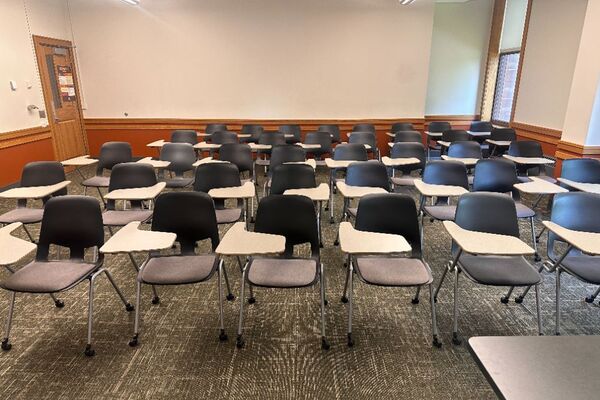 Back of room view of student tablet arm seating 