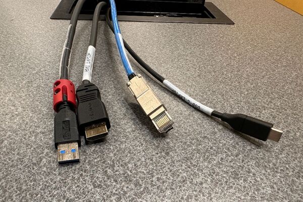 Pedestal - laptop cable connections with cables pulled out showing cable ends