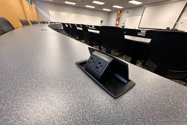 Student desk with built in power outlet