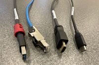 Pedestal - laptop cable connections with cables pulled out showing cable ends
