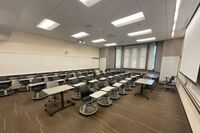 Back of room view of student tablet arm seating 