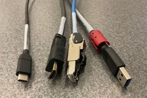 Pedestal - laptop cable connections with cables pulled out showing cable ends