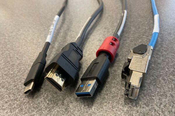 Pedestal - laptop cable connections with cables pulled out showing cable ends
