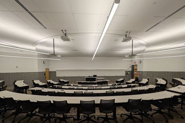 Front of room view with lectern center in front of markerboard 