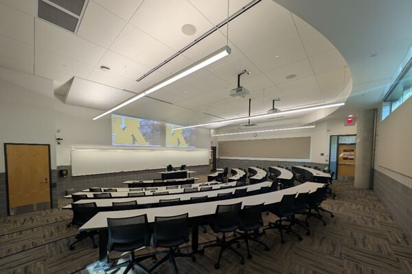Front of room view with lectern center in front of markerboard 