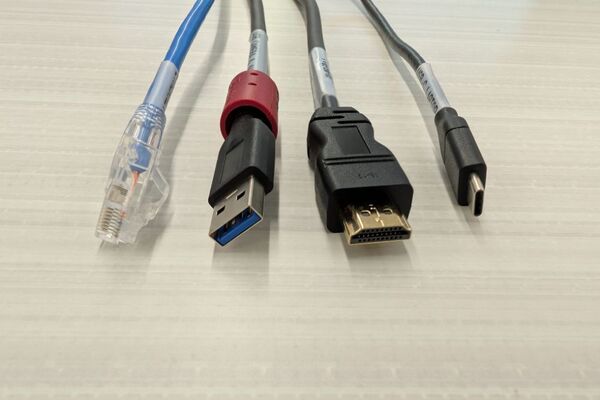 Pedestal - laptop cable connections with cables pulled out showing cable ends
