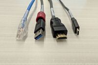 Pedestal - laptop cable connections with cables pulled out showing cable ends
