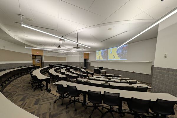 Front of room view with lectern center in front of markerboard 