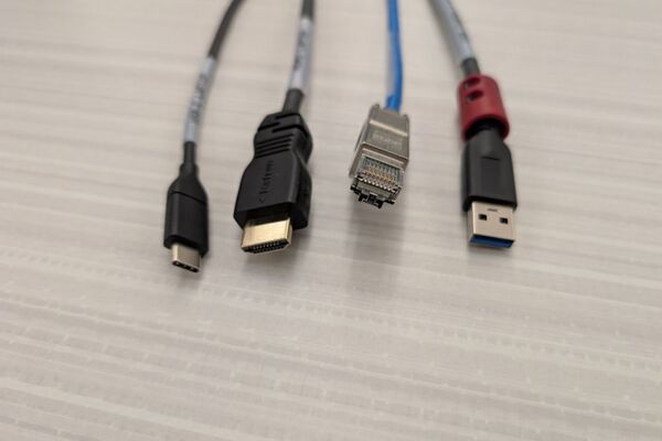 Pedestal - laptop cable connections with cables pulled out showing cable ends