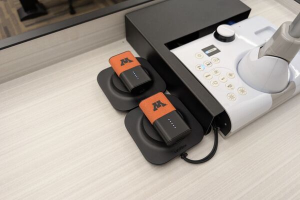 Pedestal - showing two wireless mics in charging base