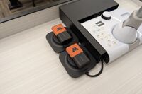 Pedestal - showing two wireless mics in charging base