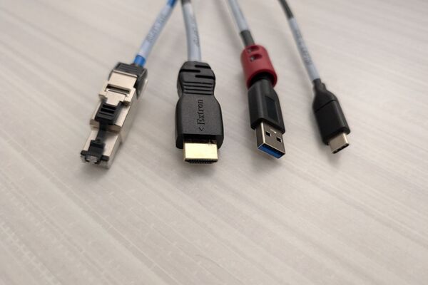Pedestal - laptop cable connections with cables pulled out showing cable ends