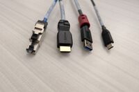 Pedestal - laptop cable connections with cables pulled out showing cable ends