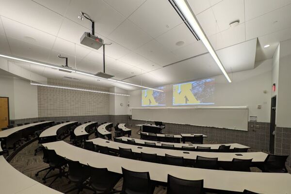 Front of room view with lectern center in front of markerboard 