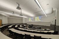 Front of room view with lectern center in front of markerboard 
