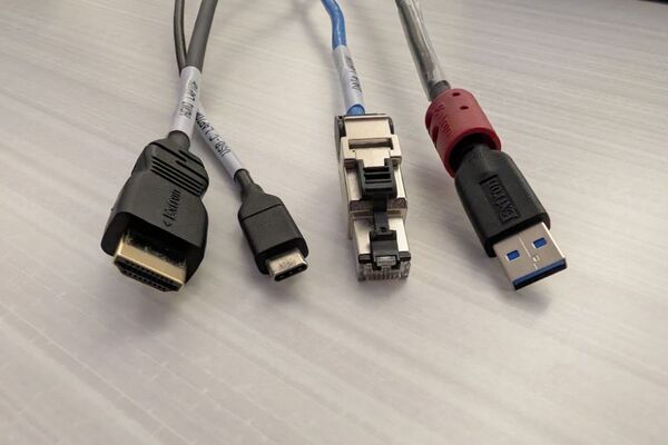 Pedestal - laptop cable connections with cables pulled out showing cable ends