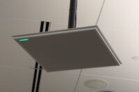 microphone tile mounted to the ceiling to provide coverage over student seating