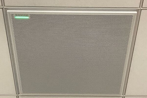 microphone tile mounted to the ceiling to provide coverage over student seating