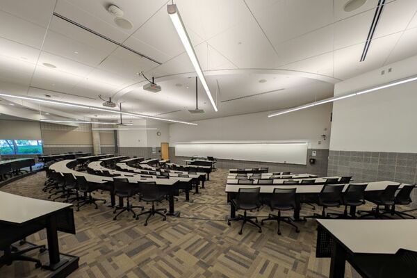 Front of room view with lectern center in front of markerboard 