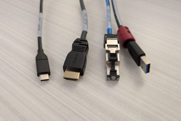 Pedestal - laptop cable connections with cables pulled out showing cable ends