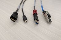 Pedestal - laptop cable connections with cables pulled out showing cable ends