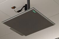 microphone tile mounted to the ceiling to provide coverage over student seating