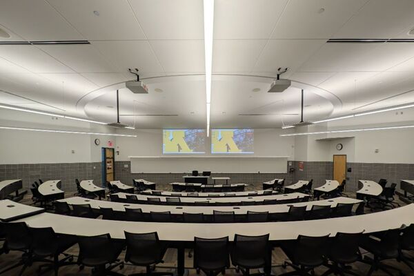 Front of room view with lectern center in front of markerboard 