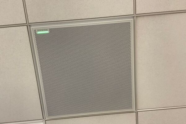microphone tile mounted to the ceiling to provide coverage over student seating