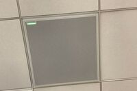 microphone tile mounted to the ceiling to provide coverage over student seating