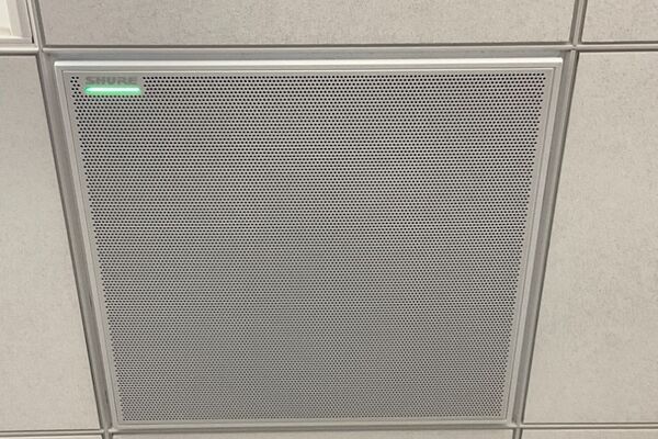 microphone tile mounted to the ceiling to provide coverage over student seating