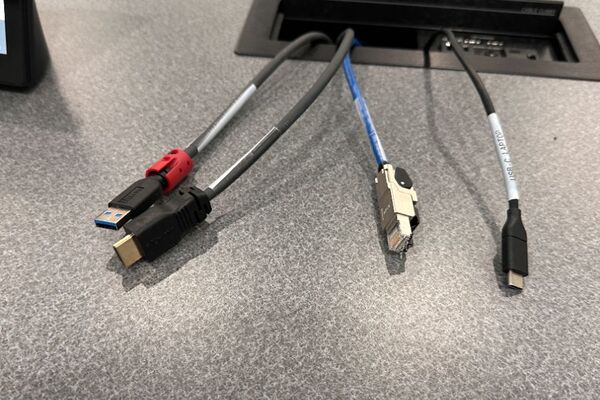 Pedestal - laptop cable connections with cables pulled out showing cable ends