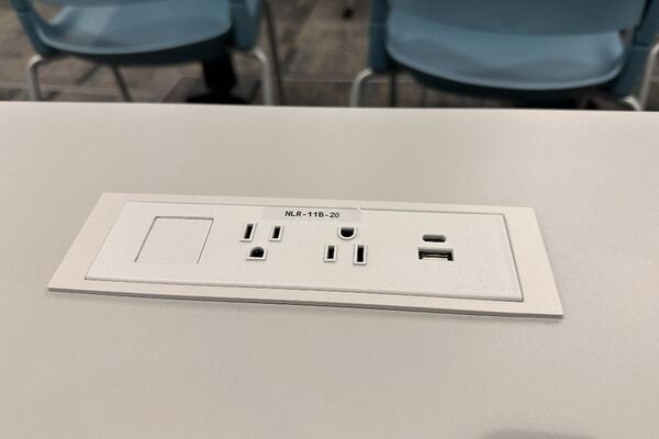Student desk with built in power outlet