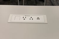 Student desk with built in power outlet	