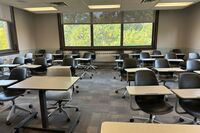 Back of room view of student tablet arm seating 