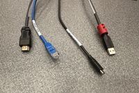 Pedestal - laptop cable connections with cables pulled out showing cable ends