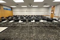 Back of room view of student tablet arm seating 