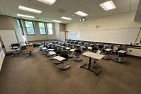 Back of room view of student tablet arm seating 