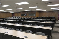 Photo of back of room from front of room.