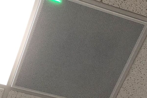White 2’ x 2’ tile mounted in the ceiling to provide microphone coverage over student seating